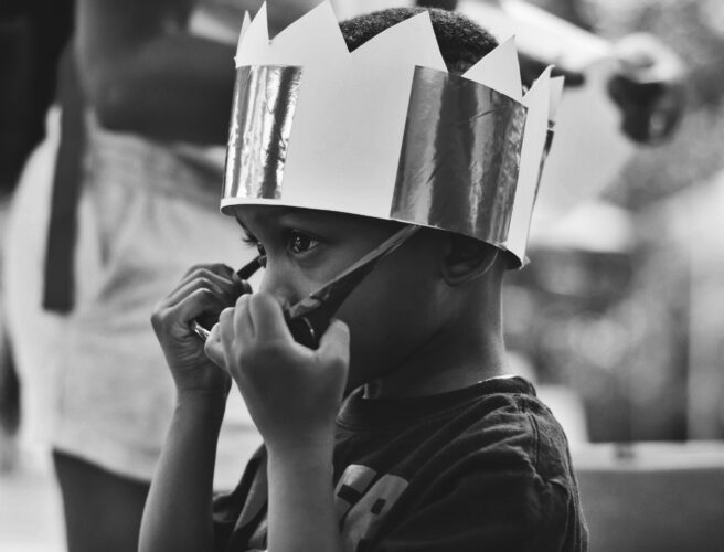 little boy in a crown